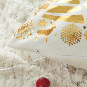 White Christmas pillow case with gold reindeer print and hidden zipper closure detail