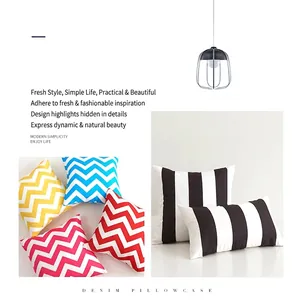 Close-up of waterproof outdoor cushion covers with colorful wave and stripe patterns