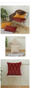 Detail view of 3D geometric plush cushion covers in burgundy and mustard yellow colors