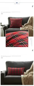 Detailed view of red and green plaid cushion covers in square and lumbar shapes on a sofa