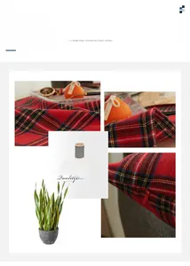 Detail view of red plaid pillow cover showing hidden zipper and precise sewing craftsmanship