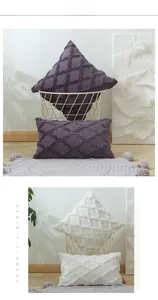 Detail of purple and white geometric plush pillowcases with 3D diamond quilted texture