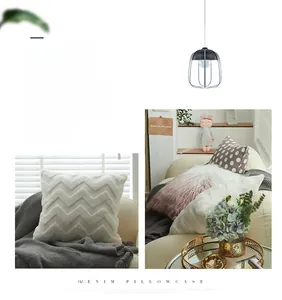Detail of plush pink gradient and white chevron textured decorative pillow covers