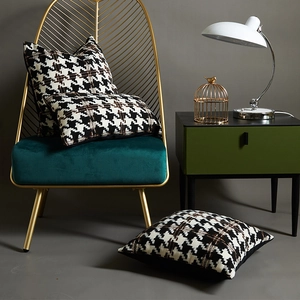 Modern houndstooth pillow covers with tufted texture on a luxury velvet chair