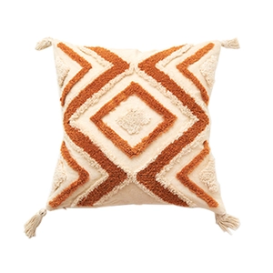 Housse de coussin beige bohème avec motifs géométriques touffetés et glands d'angle