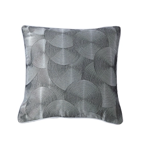 Modern square pillow cover with silver geometric concentric circles and white piping edge