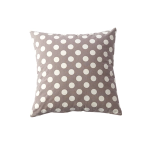 Brown square pillow featuring white polka dots on a minimalist white background