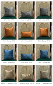 Detail of velvet pillow covers with gold embossed lines in various colors and sizes