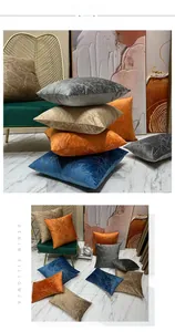 Detailed close-up of velvet pillowcase featuring gold marble texture and soft fabric