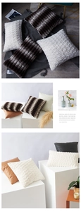 Detail of plush corn striped cushion covers in various textures and neutral colors