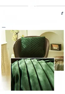 Close-up of dark green velvet pillow cover featuring handmade pleated texture and fabric