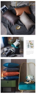 Detailed view of textured faux leather pillow covers in multiple colors and textures
