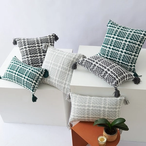 Nordic checkered decorative pillows with tassels in dark green, grey and charcoal black