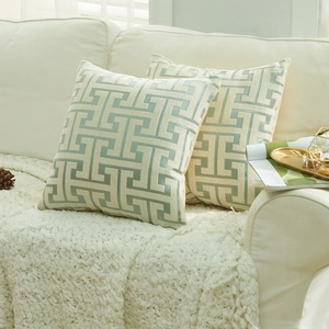 Modern chenille geometric pattern pillow covers in sage green and cream white for sofa decor