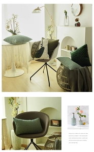 Detailed view of Nordic style green houndstooth and velvet pillow covers with leaf embroidery