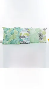 Macro detail of high-quality invisible metal zipper on satin green leaf pillowcase cover