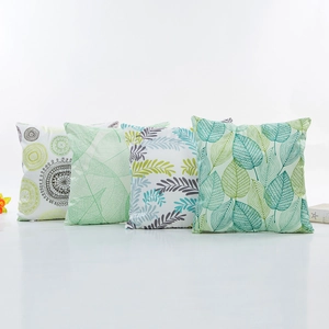 Modern faux silk pillow covers with green leaf and geometric patterns in Nordic style