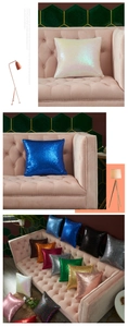 Detailed view of colorful sequin pillow covers arranged on a modern velvet sofa