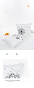 Detail of white dandelion pillowcase with silk-like fabric and invisible zipper closure
