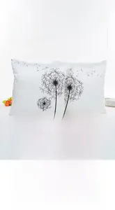 Detail of invisible metal zipper on a white silk satin dandelion pattern pillowcase