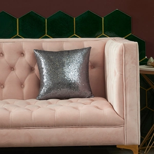 Silver sequin pillow cover on pink velvet sofa for modern Christmas home decor