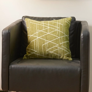 Olive green chenille decorative pillow cover with white abstract geometric line patterns