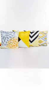 Détail de la fermeture éclair invisible en métal sur une housse de coussin géométrique