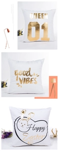Series of white pillow covers with gold foil Easter rabbit and typography designs