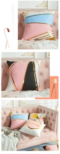 Detailed view of pink geometric cushion covers with gold foil lines and Princess text