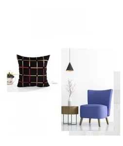Detail view of plaid chenille cushion cover featuring gold and red grid patterns