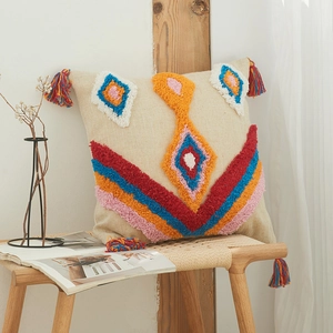 Bohemian tufted throw pillow cover with colorful diamond patterns and corner tassels