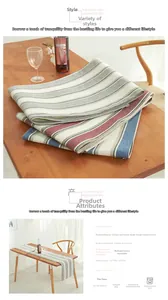 Detail of wide stripe cotton linen table runner in grey and blue with size specifications