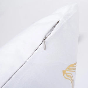 Mediterranean white cushion cover with gold nautical lines and hidden zipper detail