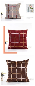 Close-up of chenille cushion covers in grey, burgundy, and brown with gold plaid patterns