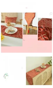 Close-up of orange geometric table runner with tassels and matching luxury cushions