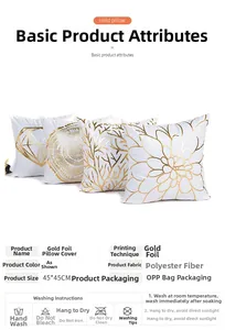 Detail of four white polyester cushion covers with gold foil tree and floral patterns