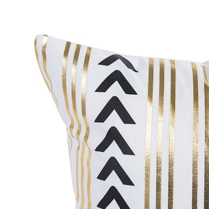 Modern white pillow case with gold foil stripes and black geometric arrow patterns