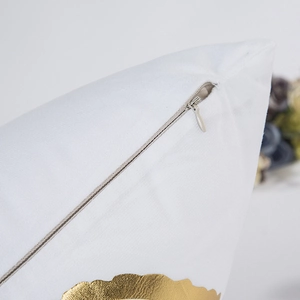 Modern white cushion cover with golden floral foil print and invisible zipper detail
