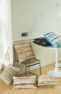 Detailed texture of Dutch velvet pillow covers with modern abstract marble stripes