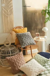 Close-up of plush velvet cushion covers with geometric jacquard diamond weaving texture