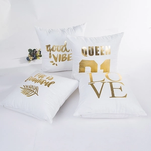 Set of 4 white plush pillow covers with gold foil lettering for modern living room sofa