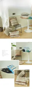 Detailed view of textured faux fur pillow covers with abstract wavy jacquard patterns