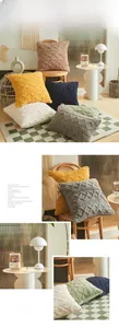 Detailed view of plush geometric jacquard pillow covers with 3D rhombus textures and patterns