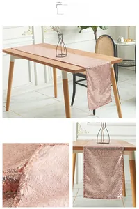 Macro detail of rose gold sequin table runner with glitter texture for wedding decor