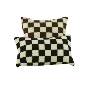 Checkered lamb wool pillow covers in black, white and brown for cozy home decor