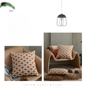 Detailed close-up of jacquard cushion cover with interlocking geometric chain patterns