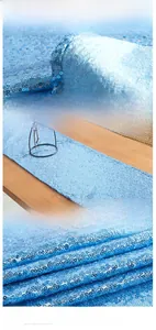 Detail shot of sky blue sequin table runner showing dense texture and elegant shimmer