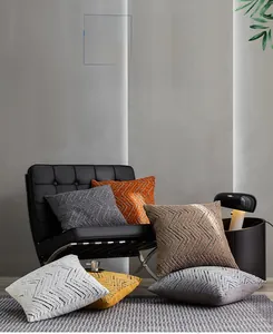 Close-up of geometric wave textured chenille pillowcases in various modern colors