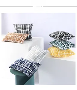 Detail of tweed woven pillowcase showing colorful texture and fabric craftsmanship
