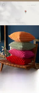 Close-up of thick plush cushions in vibrant colors with luxury wide ribbed texture
